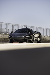 black and white sports car on road during daytime