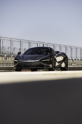 black and white sports car on road during daytime