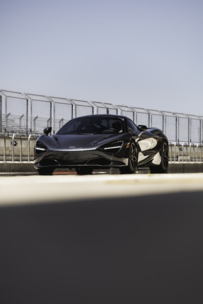 black and white sports car on road during daytime