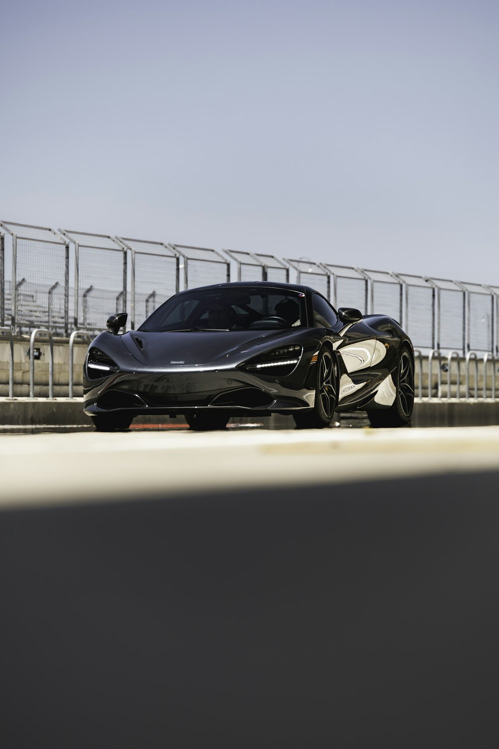 black and white sports car on road during daytime