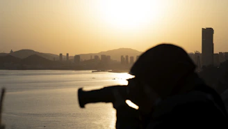 A wide-angle shot of Vancouver’s skyline at golden hour, captured with cinematic flair.