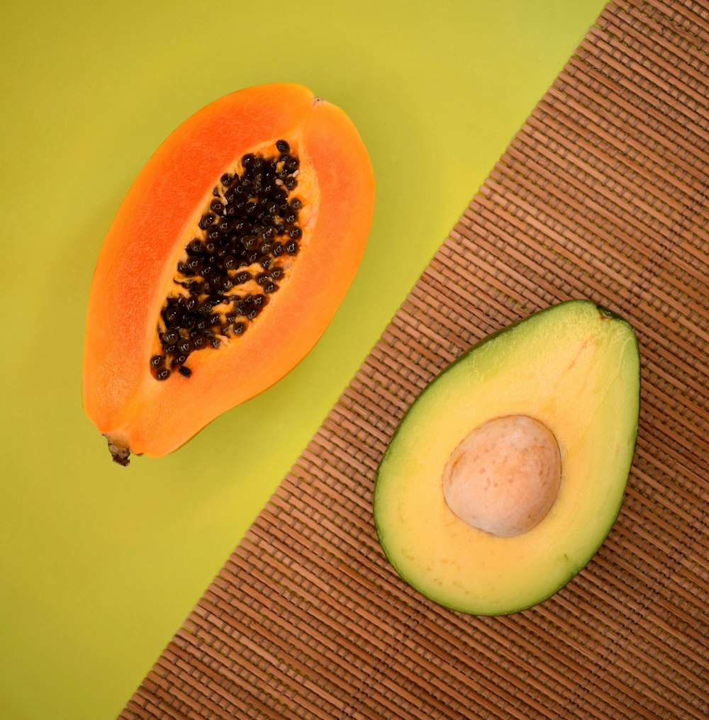 sliced avocado fruit on green plate