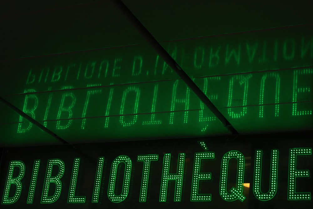 green and white led light signage