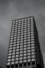 white and black concrete building under blue sky during daytime