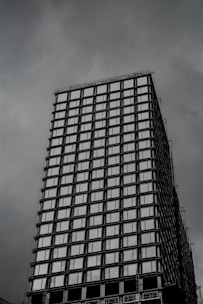 white and black concrete building under blue sky during daytime
