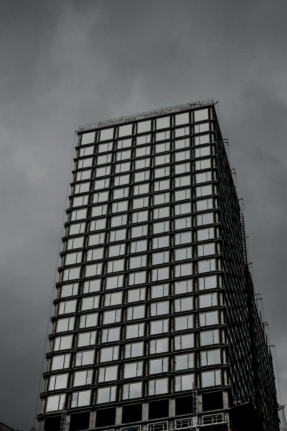 white and black concrete building under blue sky during daytime