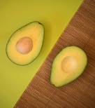 sliced apple on green surface