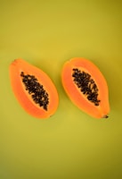 sliced yellow fruit on yellow surface