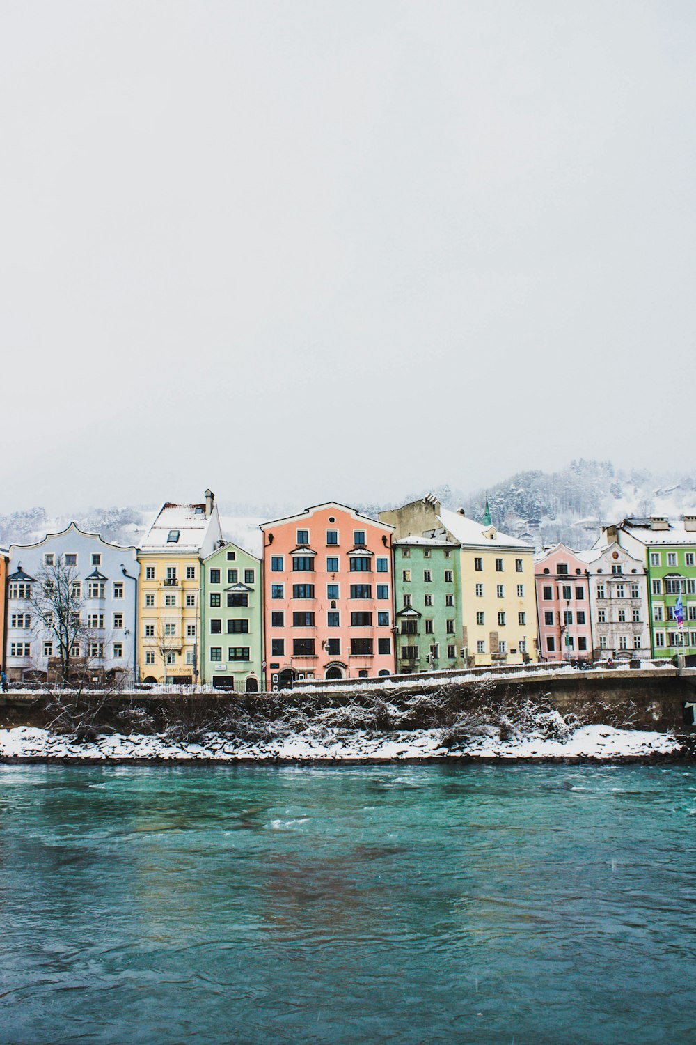 houses near body of water during daytime