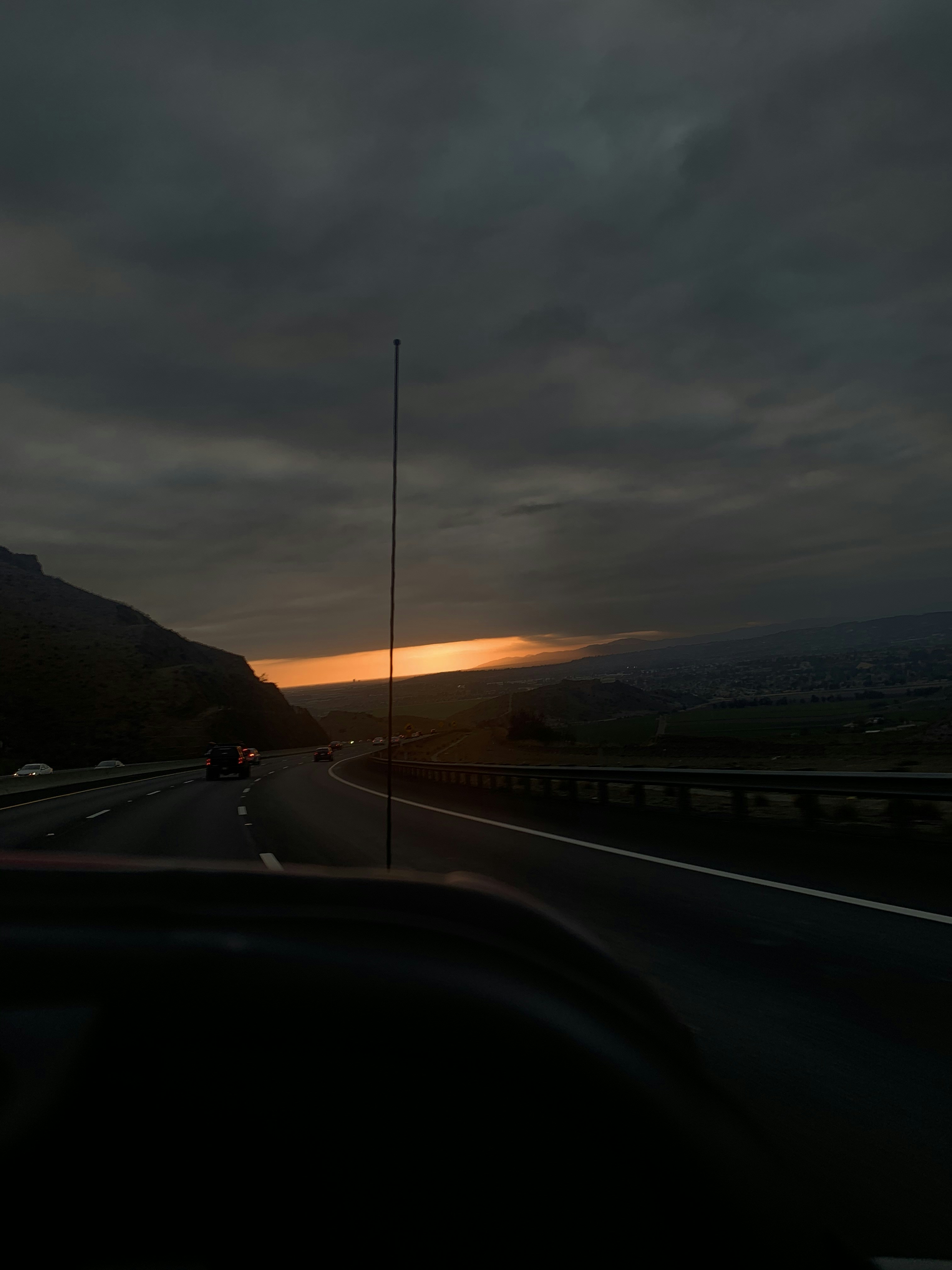 car on road during sunset