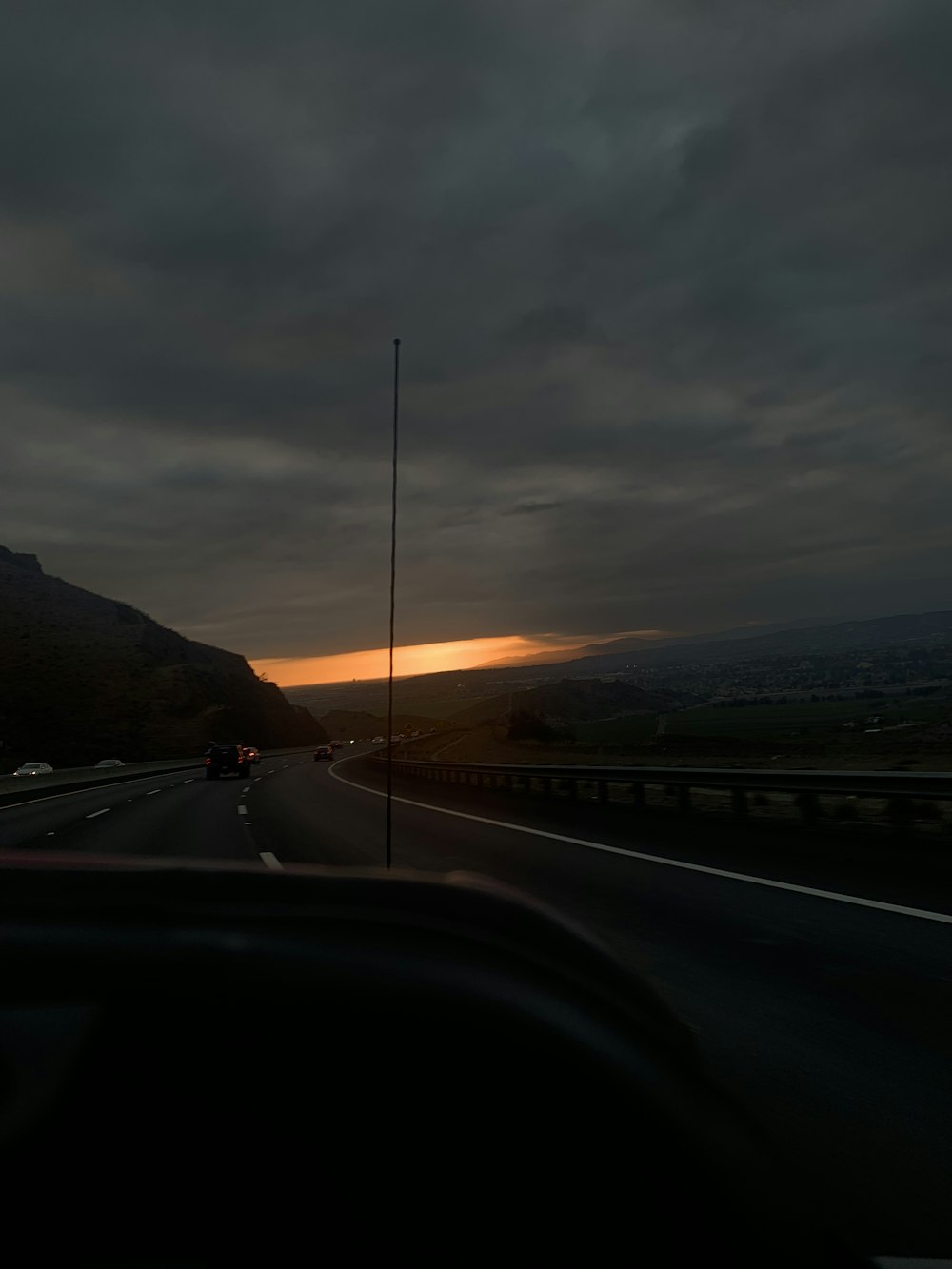 car on road during sunset