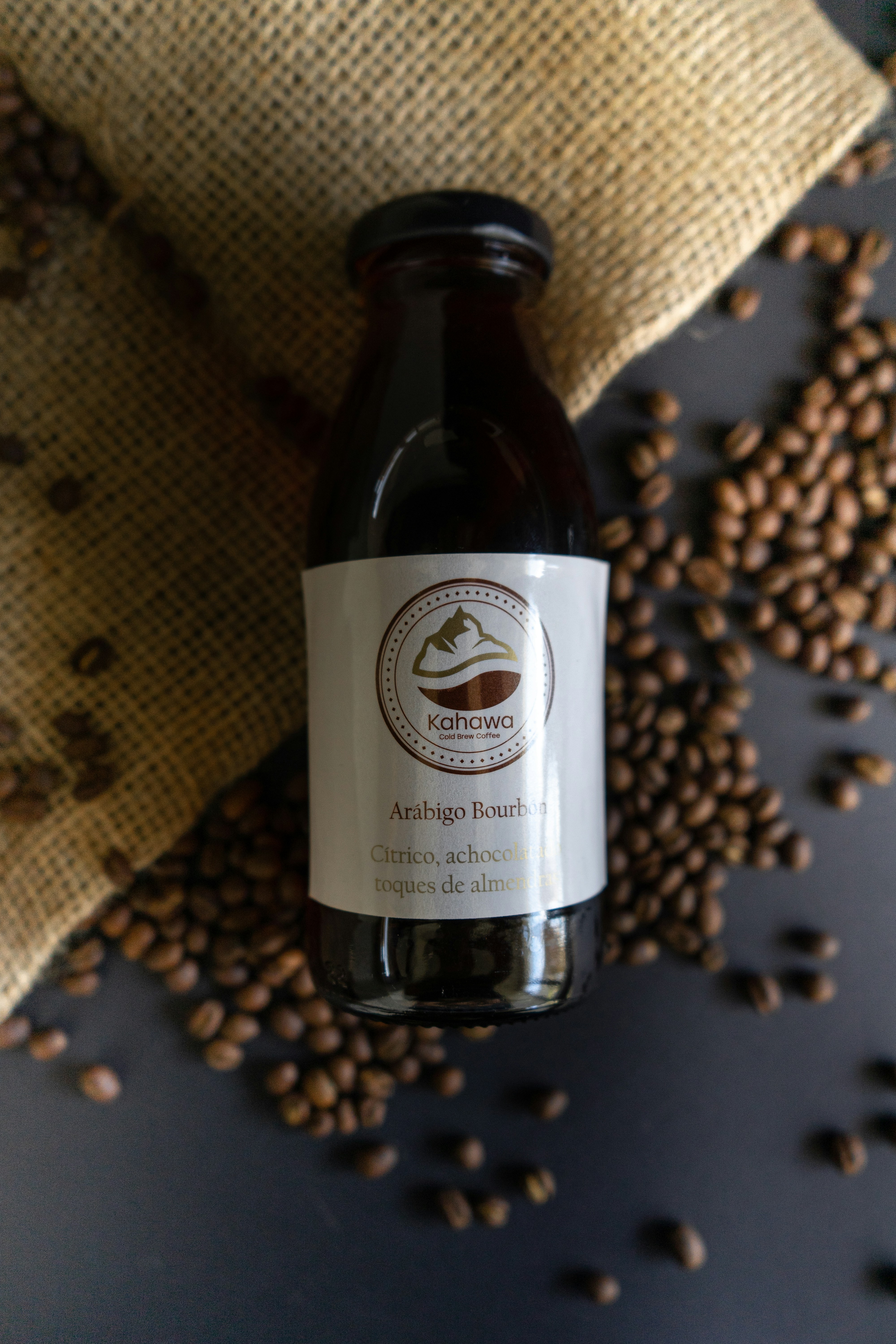 brown and white labeled bottle