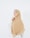 woman in beige hijab standing
