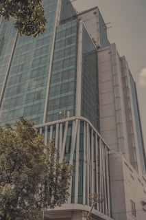 An urban commercial building with clean lines and eco-friendly features, blending into the Encino neighborhood.