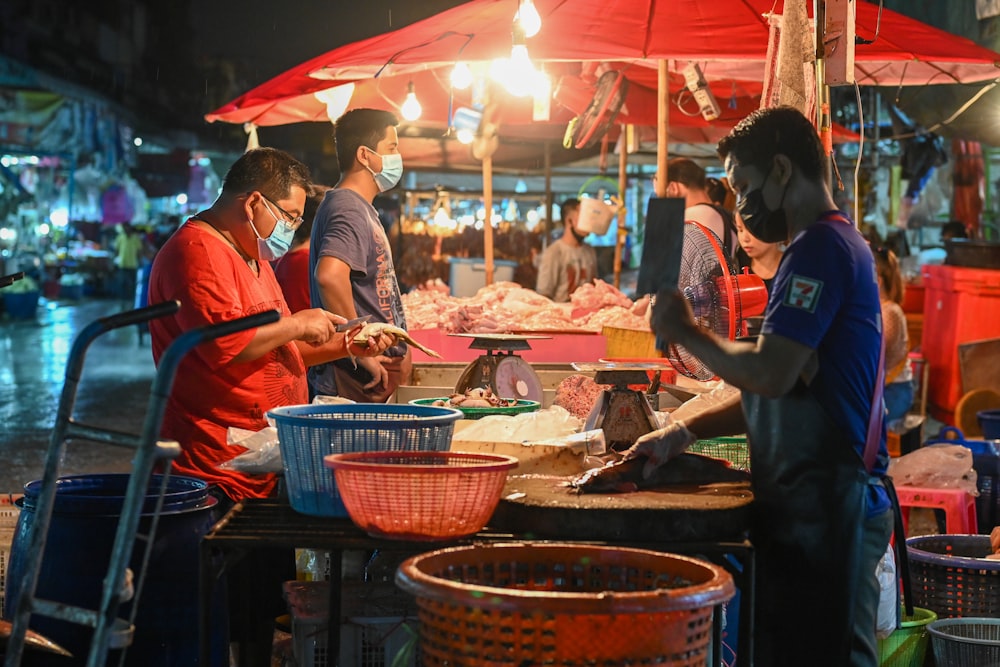 people in market during daytime