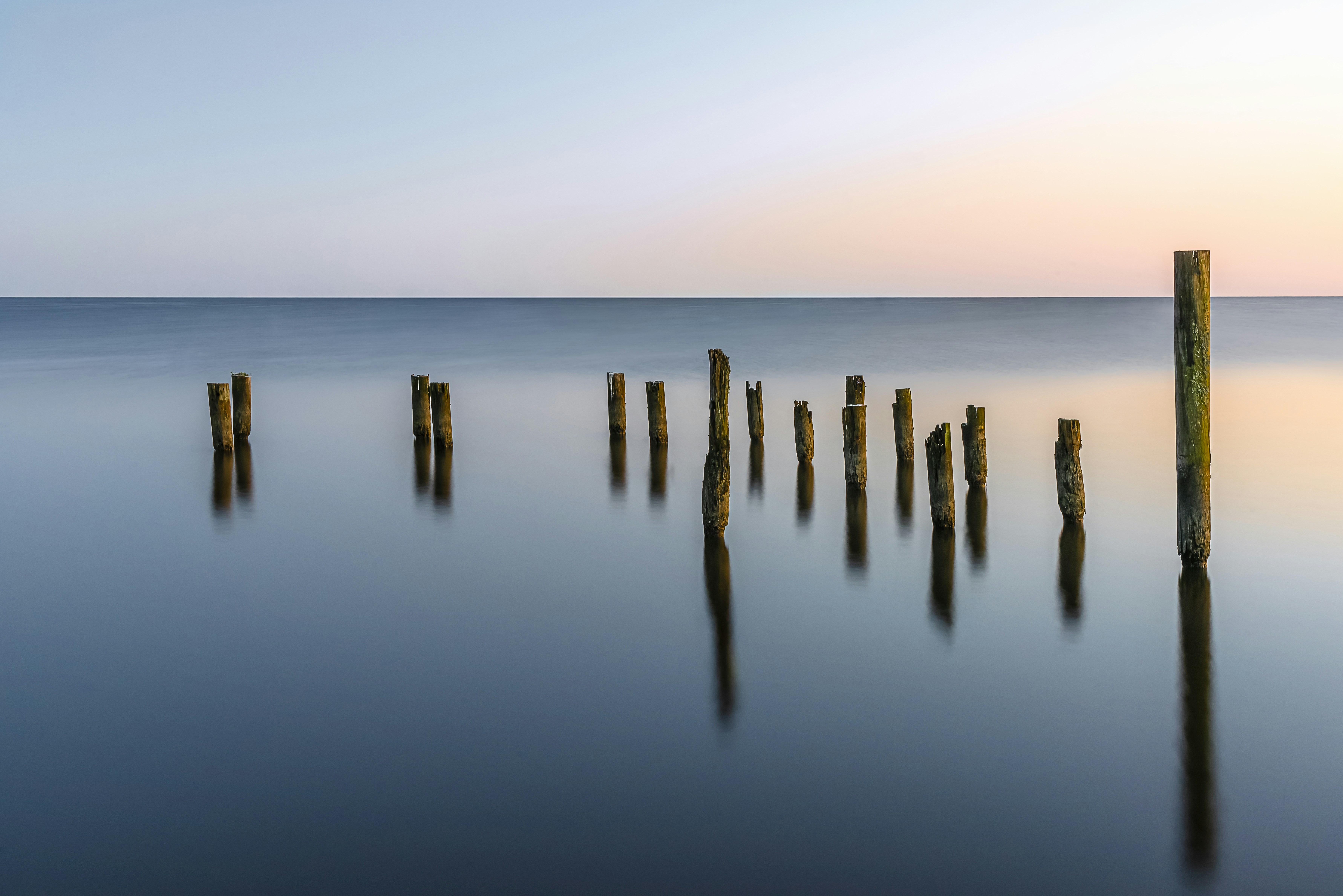 Dock pilings on the Tchefuncte River in Madisonville, LA. www.JayLammPhoto.com Purchase a print here: https://www.pictorem.com/458203/Pilings.html