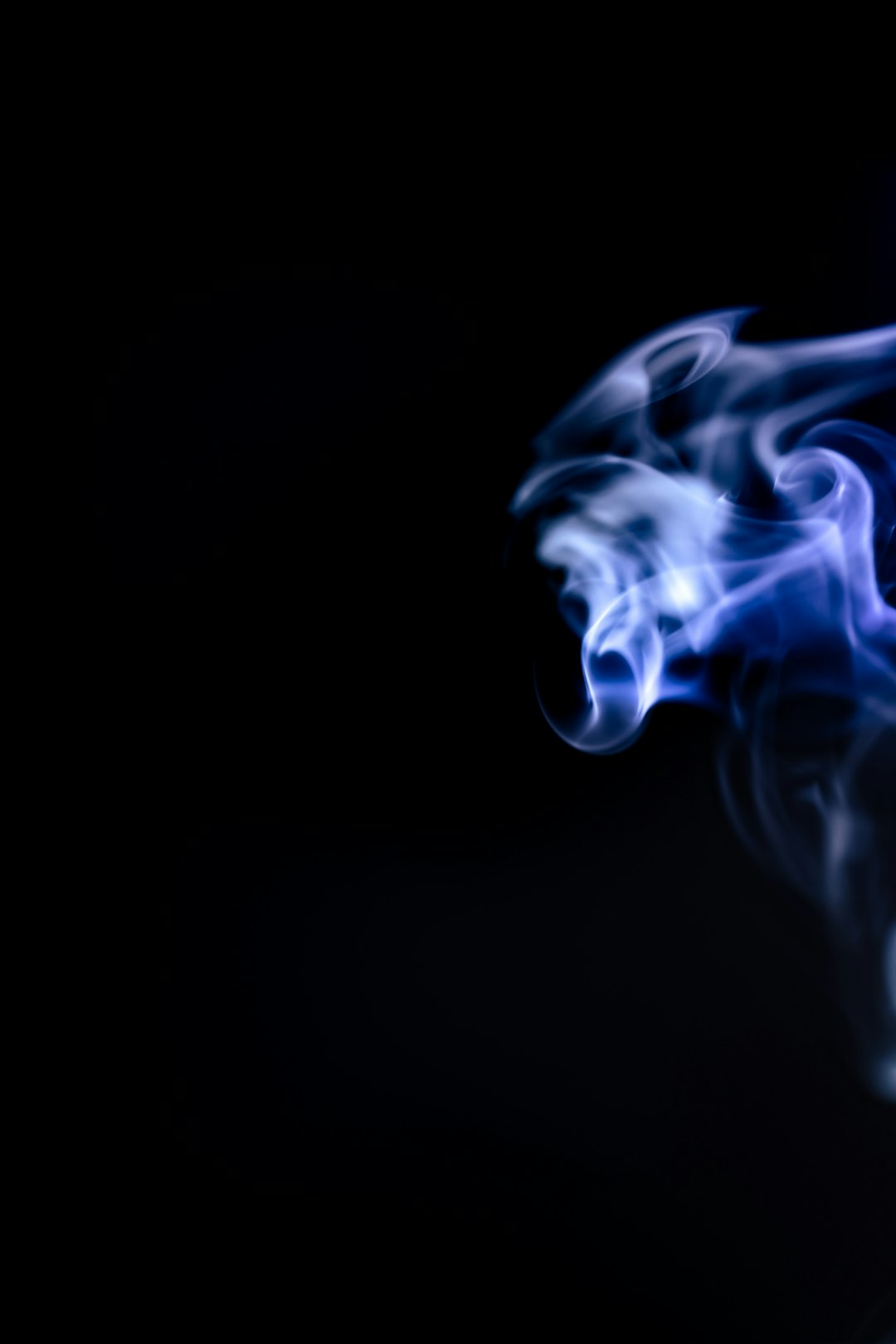 white smoke in black background