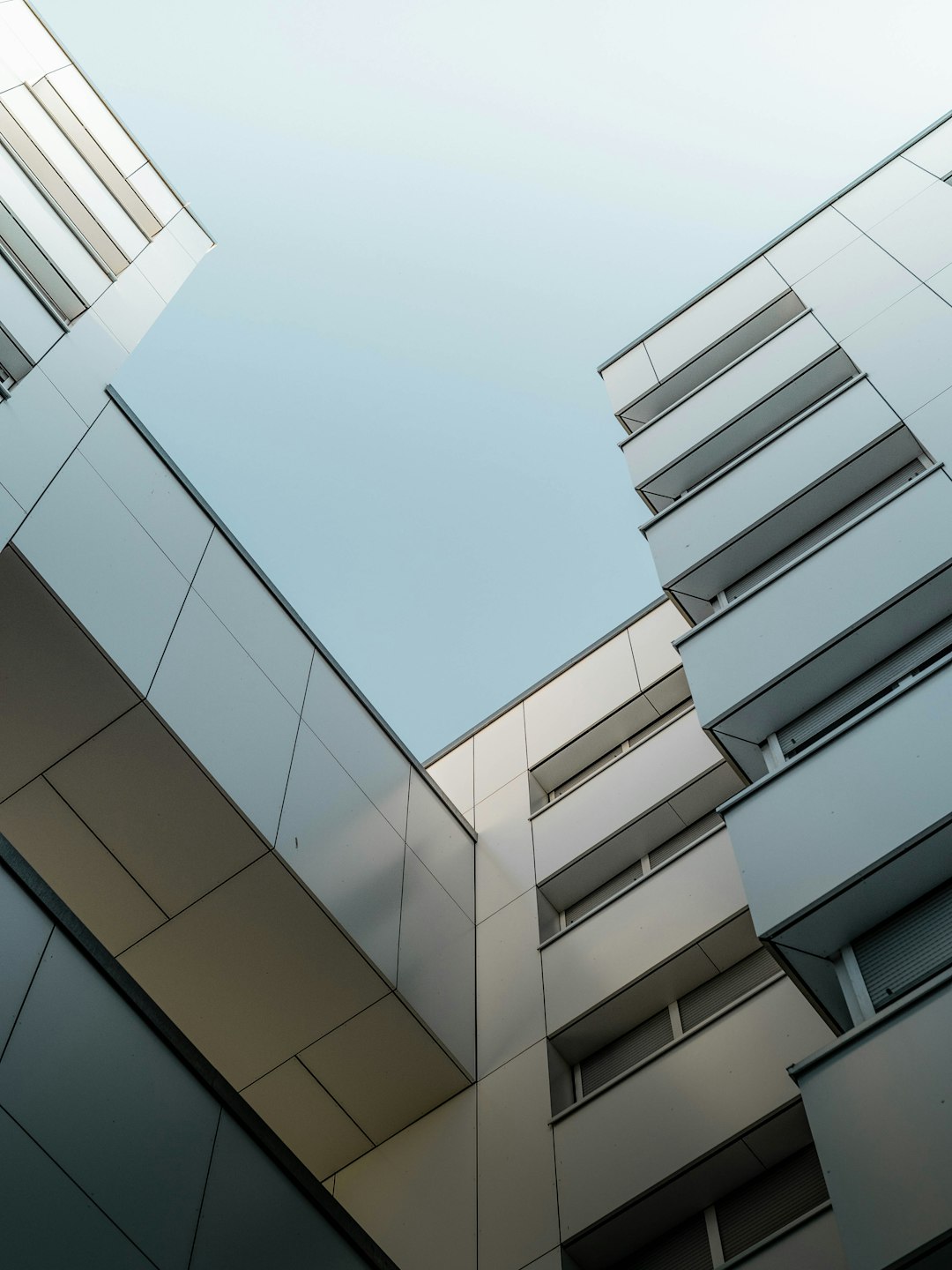 white concrete building under blue sky during daytime