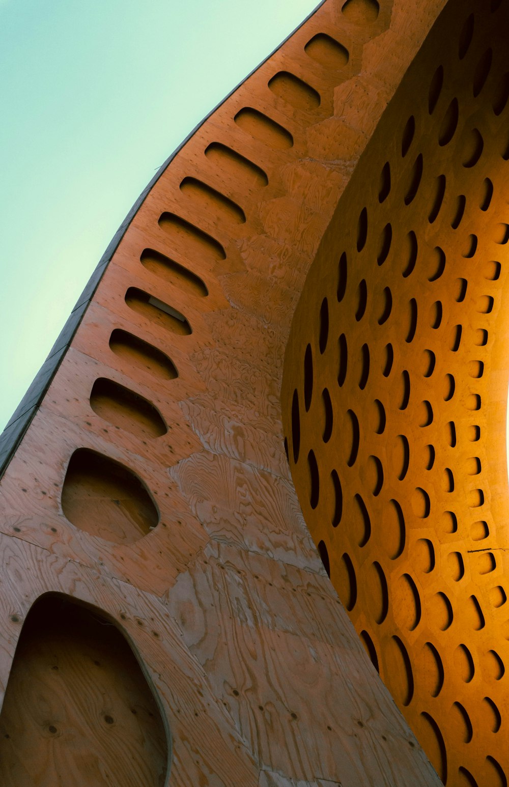 brown concrete structure under blue sky during daytime