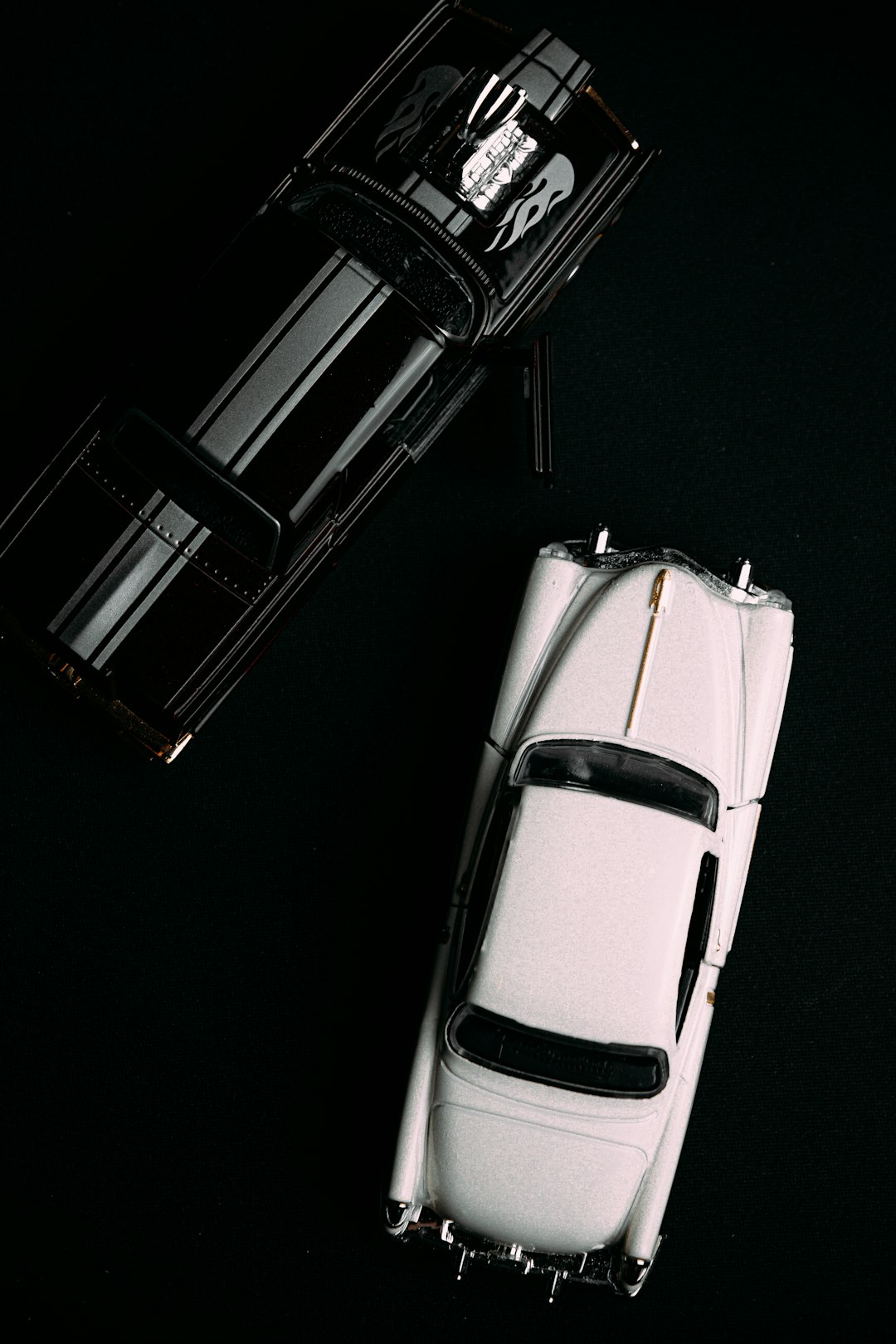 white and black car scale model