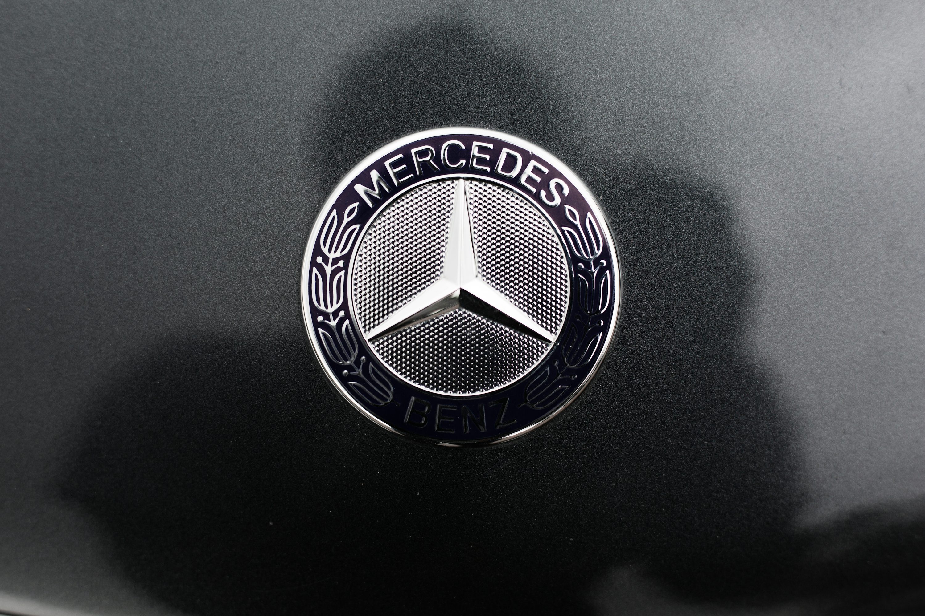 black and white round logo
