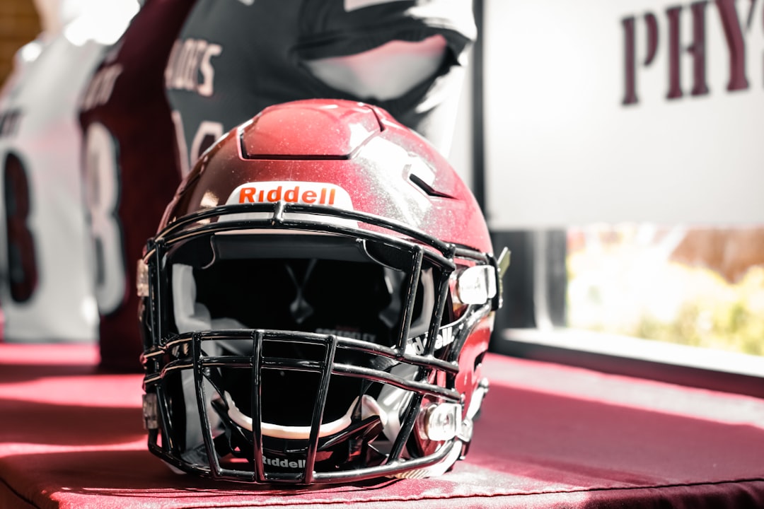 red and black football helmet