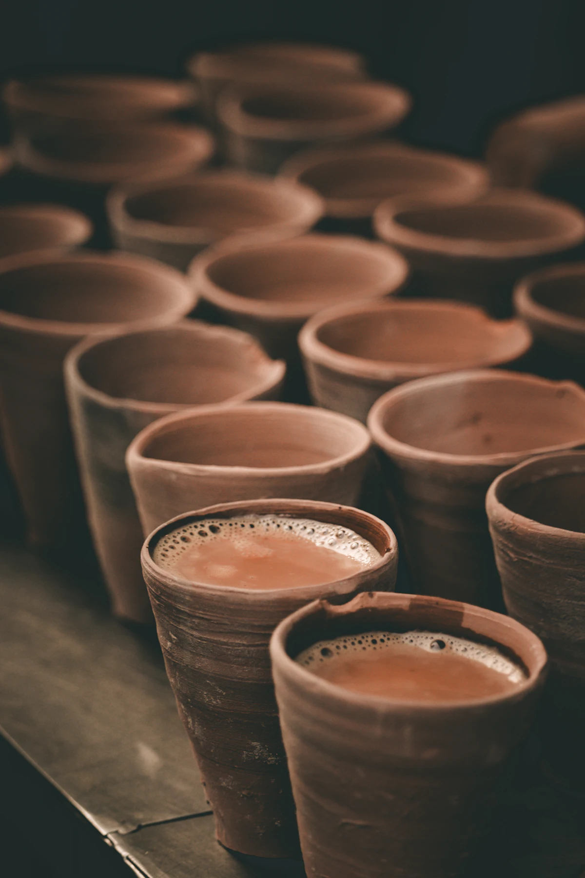 Clay tea pots on a wooden table