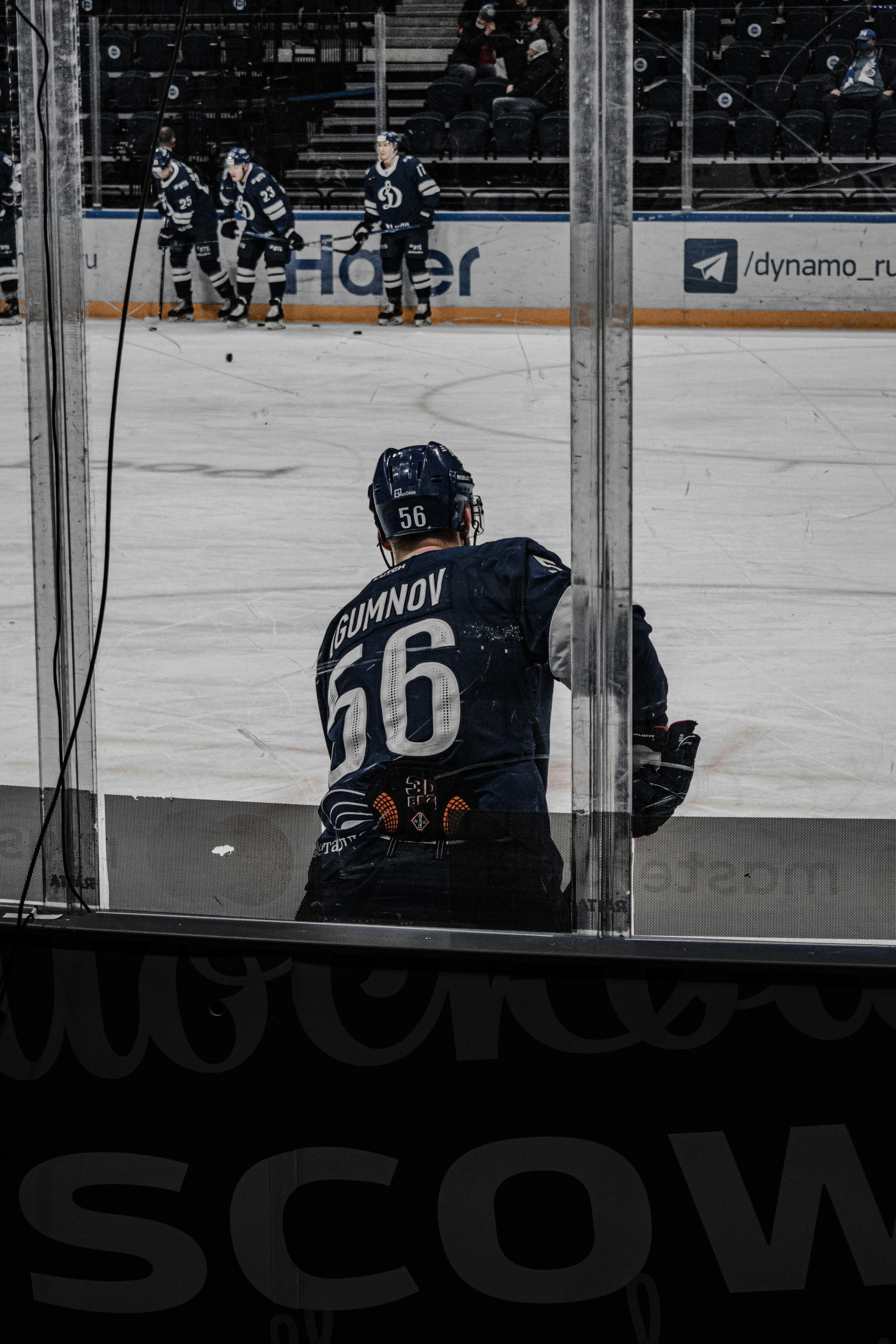 Hockey player in a blue and white sweater on the ice, illustrating how much a team uniform carries a club identity