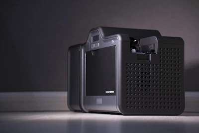 Close-up shot of a sleek medical infotainment device with clear display and ergonomic design.