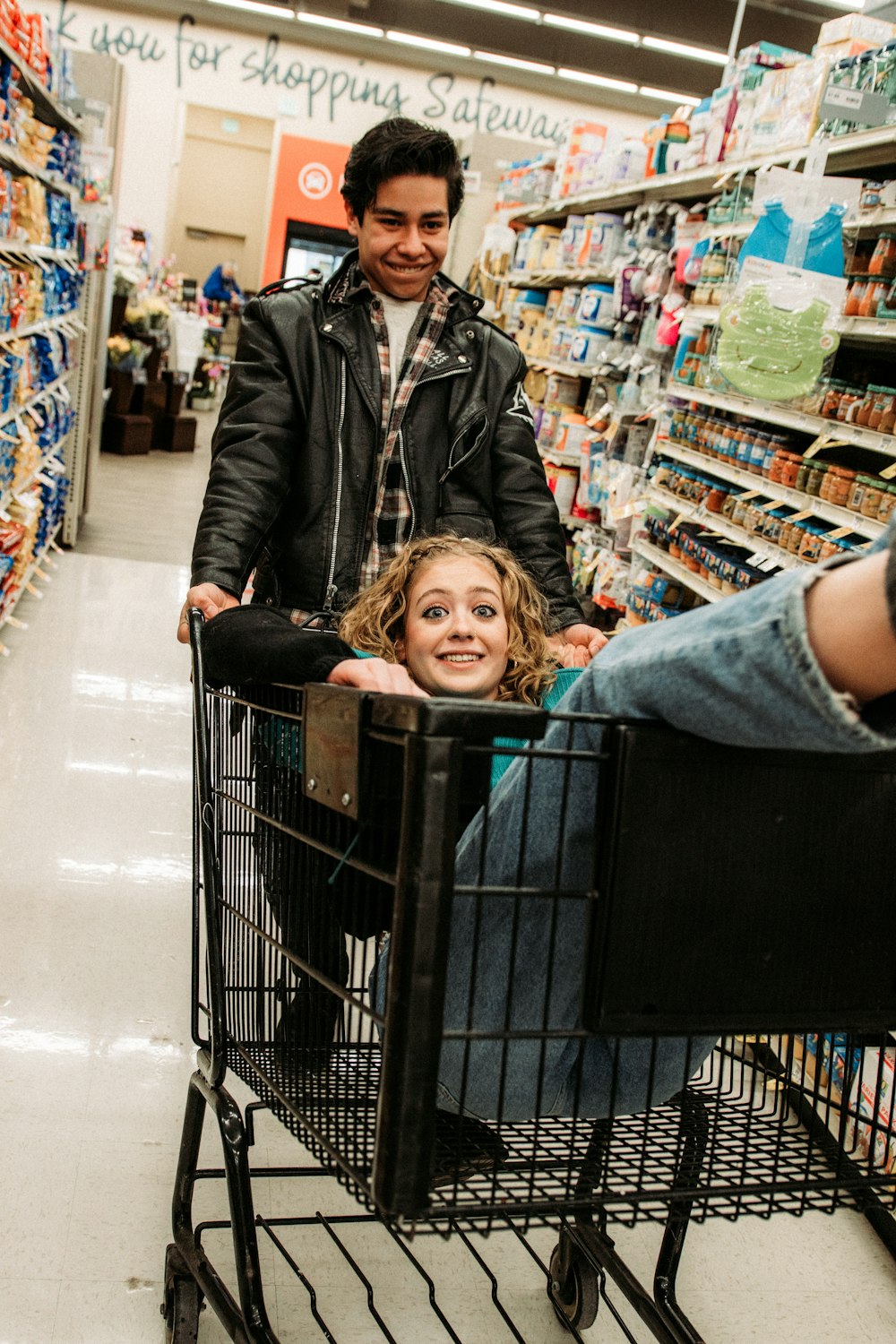 girl in blue denim jacket smiling