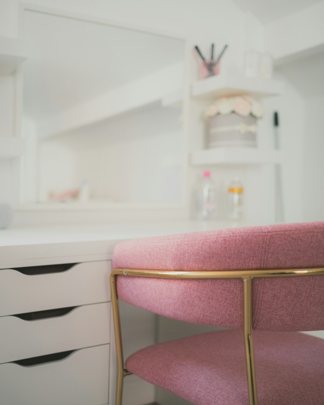 white wooden drawer with pink cushion