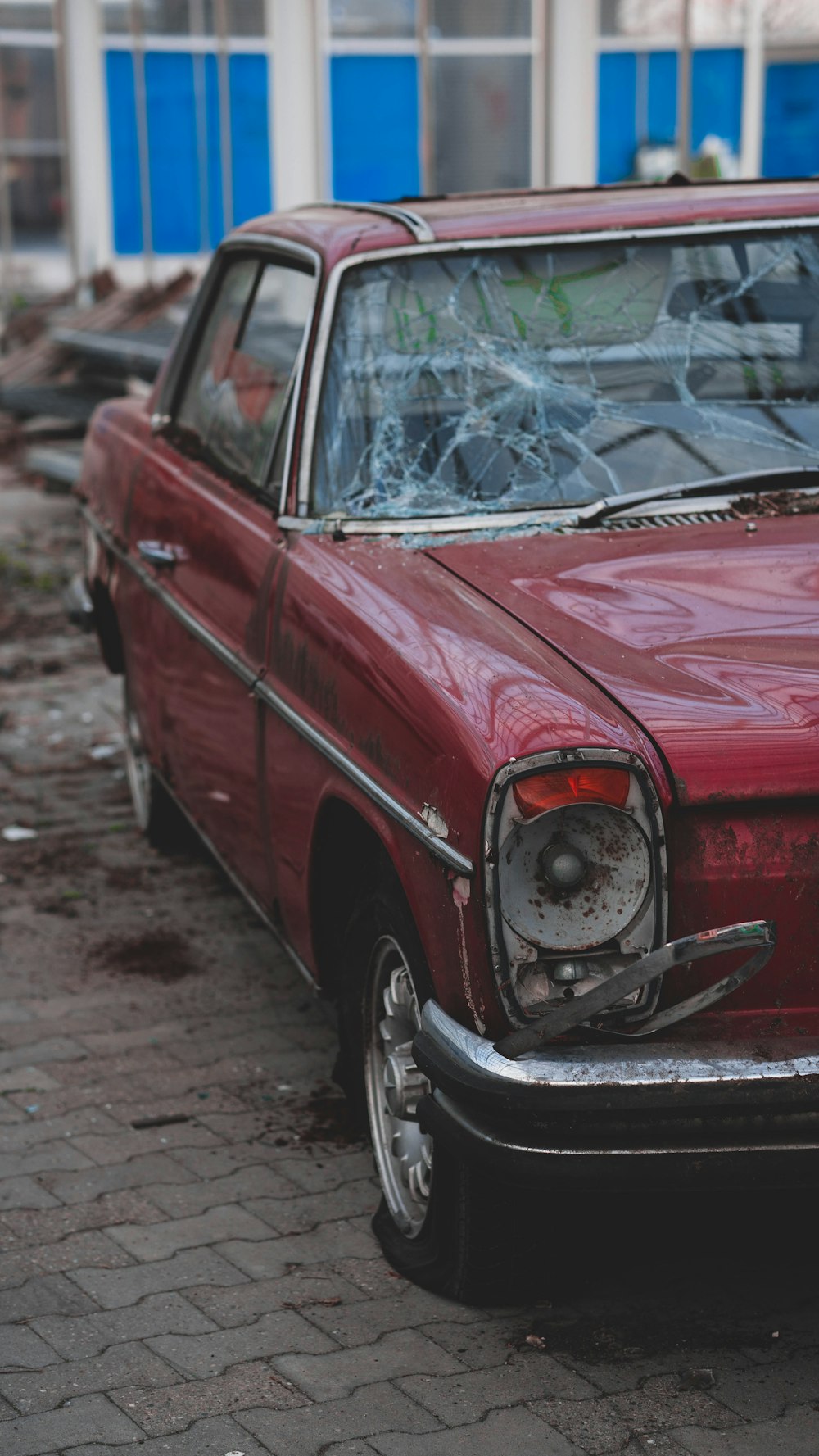 red car on gray concrete road