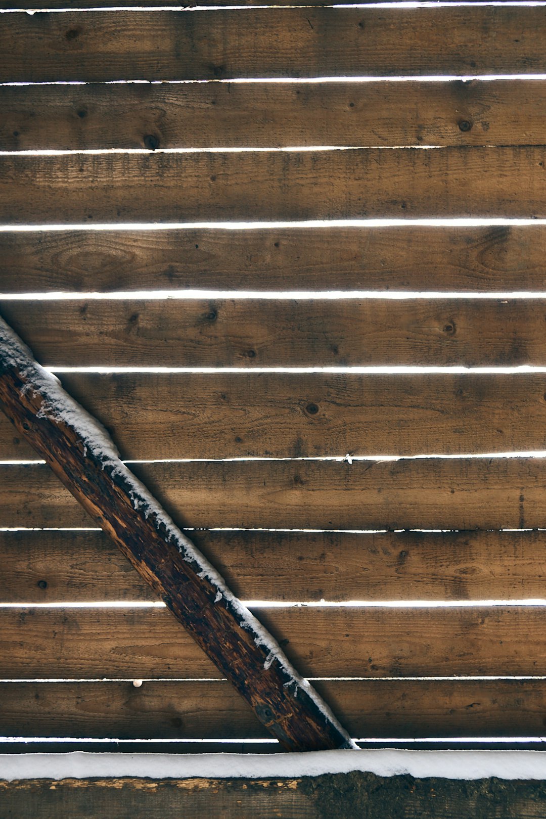 brown wooden fence on brown wooden floor