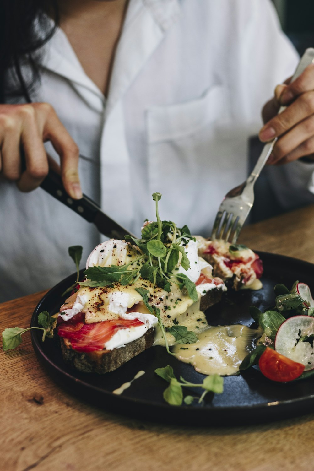 vegetable salad on black plate