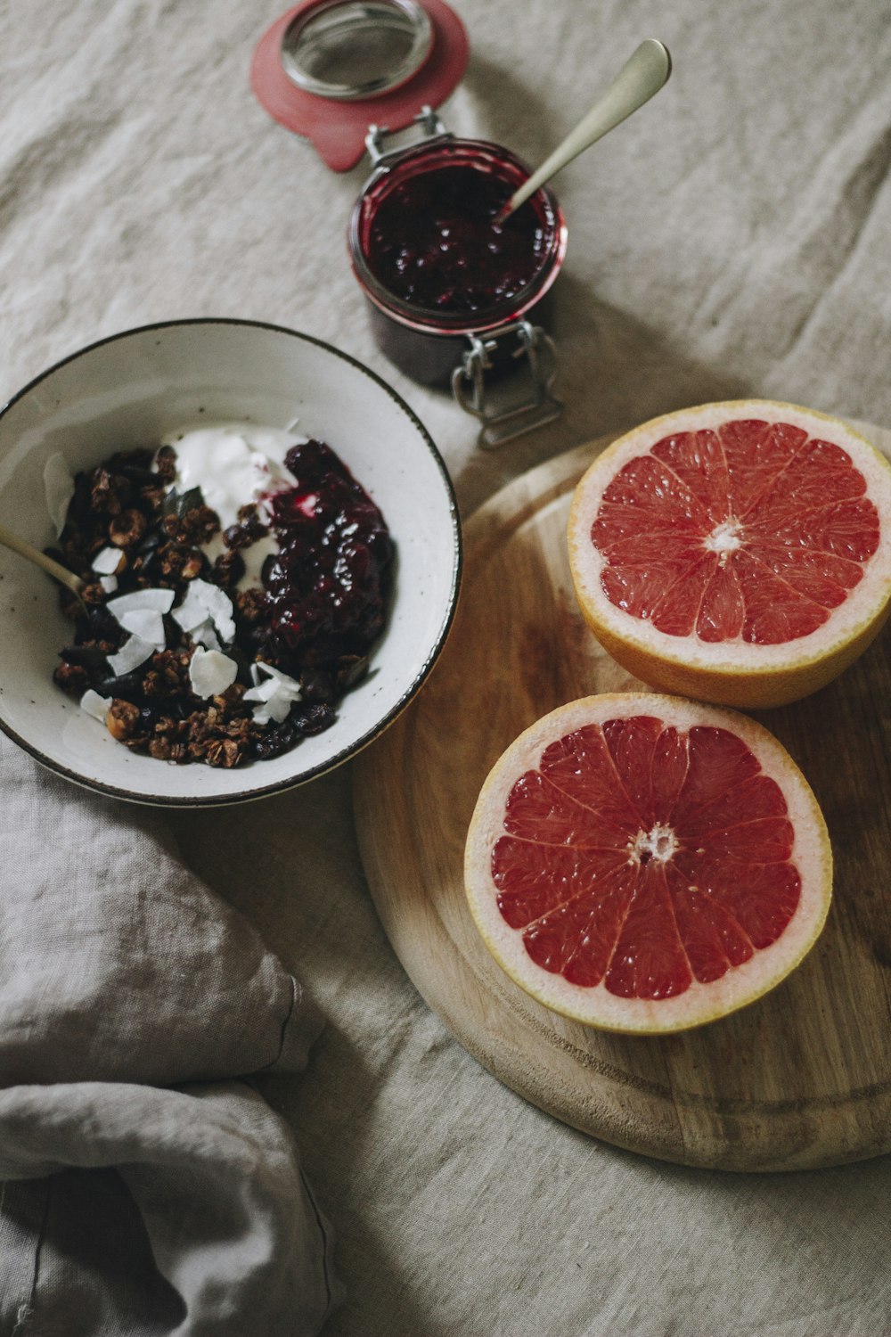 sliced orange fruit on white ceramic bowl