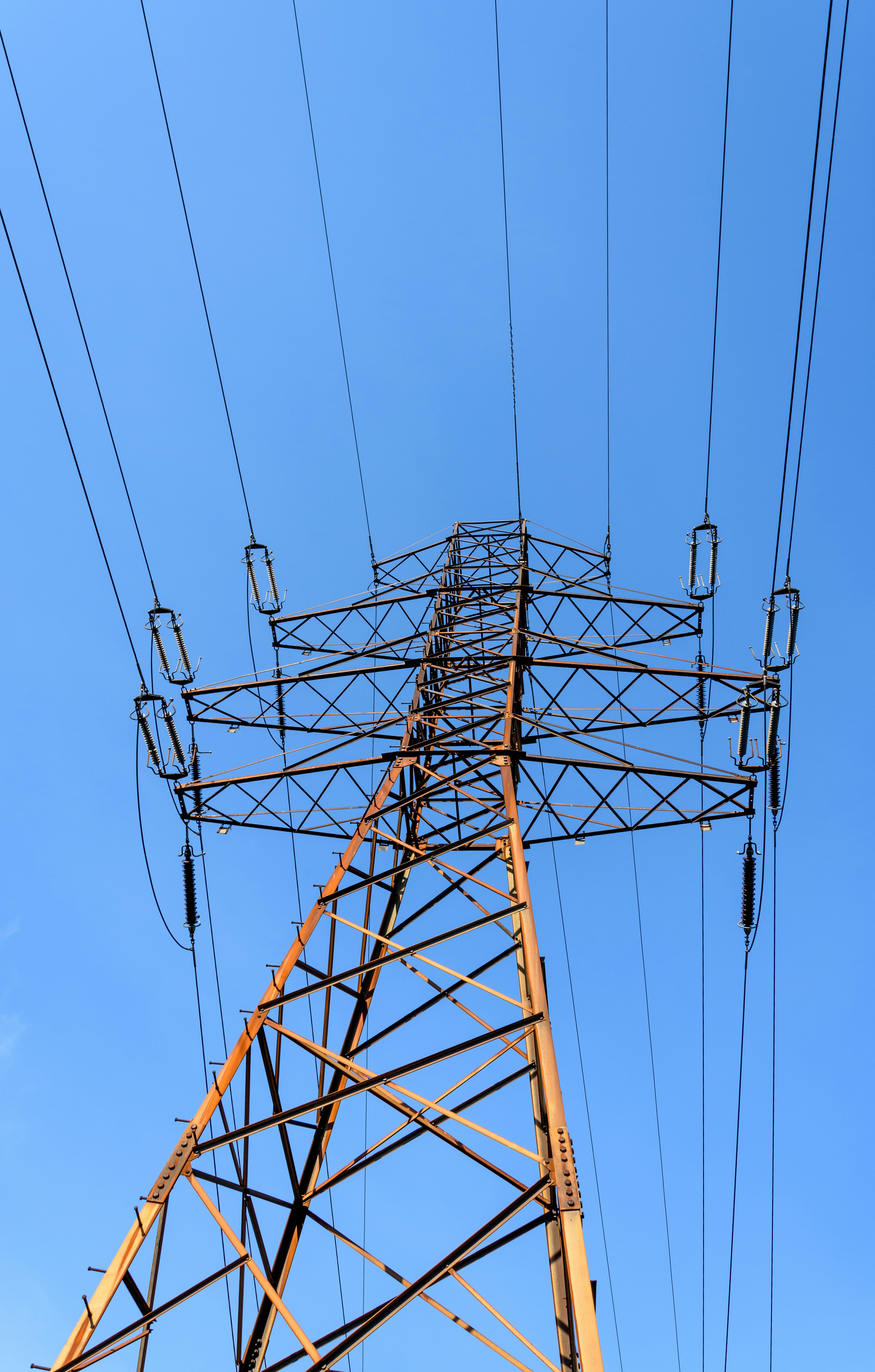 brown metal tower under blue sky during daytime