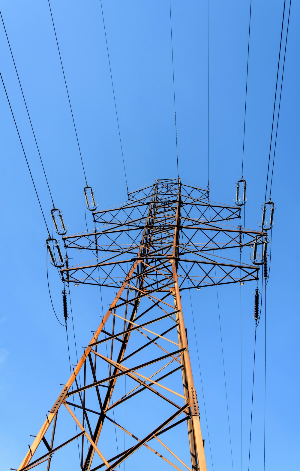 brown metal tower under blue sky during daytime