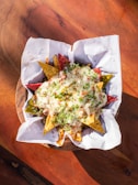 Baskets of crispy chips accompanied by a variety of salsas.