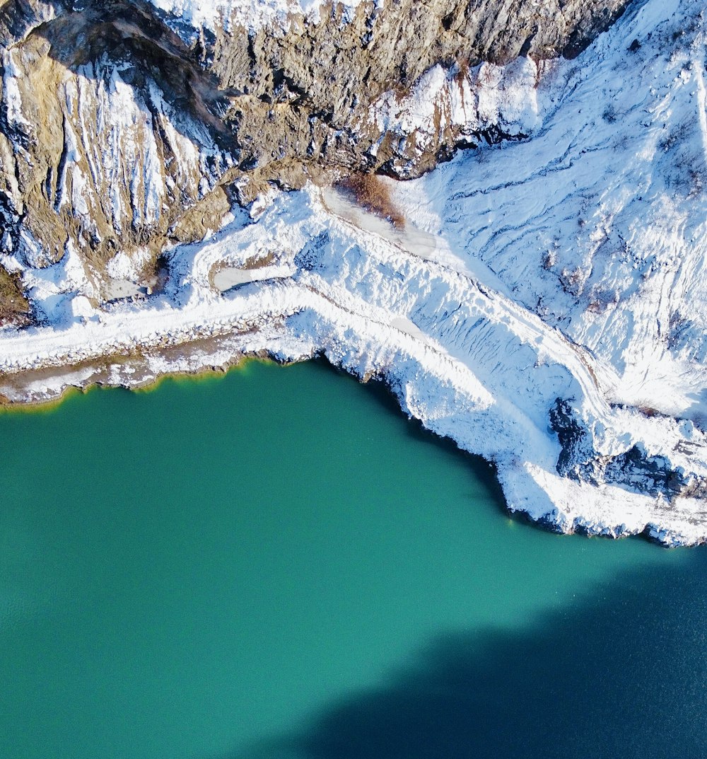 aerial view of lake and mountains