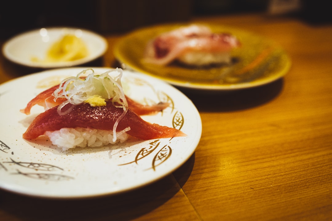 white rice with meat on white ceramic plate