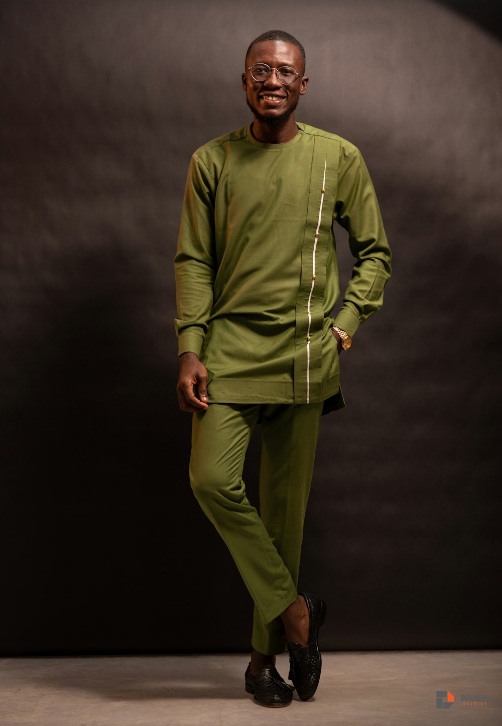 man in green long sleeve shirt and pants