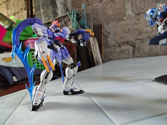 A close-up of shiny Digimon figures arranged in battle poses on a bright background.