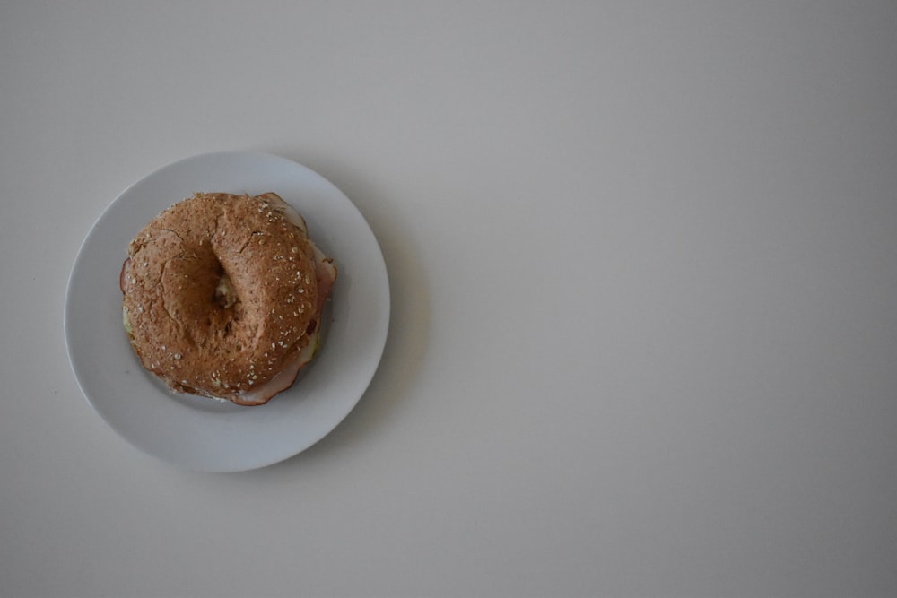 doughnut on white ceramic plate