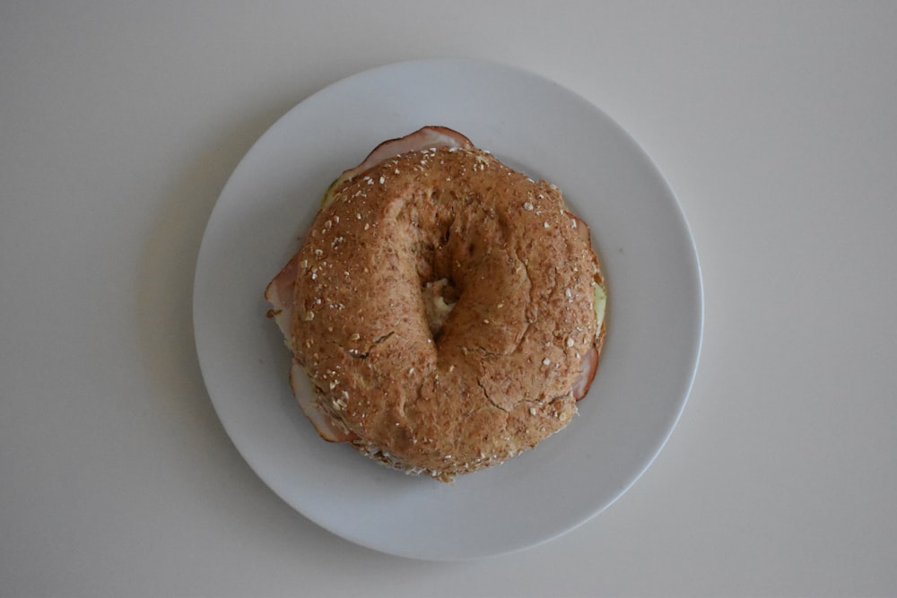 doughnut on white ceramic plate