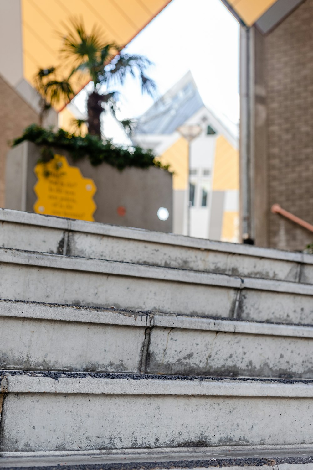 yellow and white painted concrete staircase