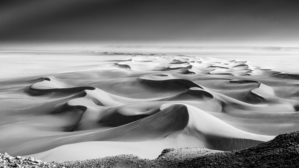 grayscale photo of water waves