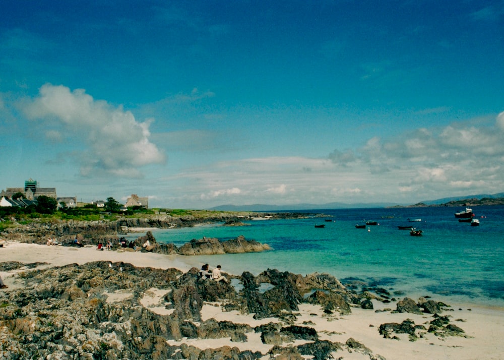 blue sea under blue sky and white clouds during daytime