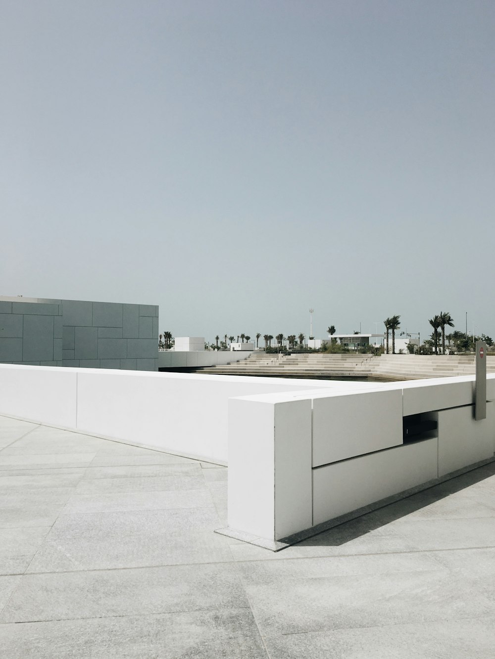 white concrete building under blue sky during daytime