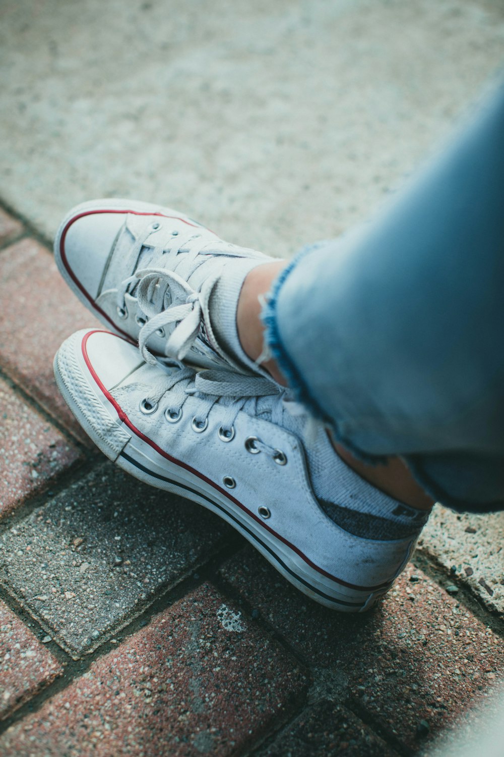 person wearing white converse all star high top sneakers photo – Free  Converse Image on Unsplash