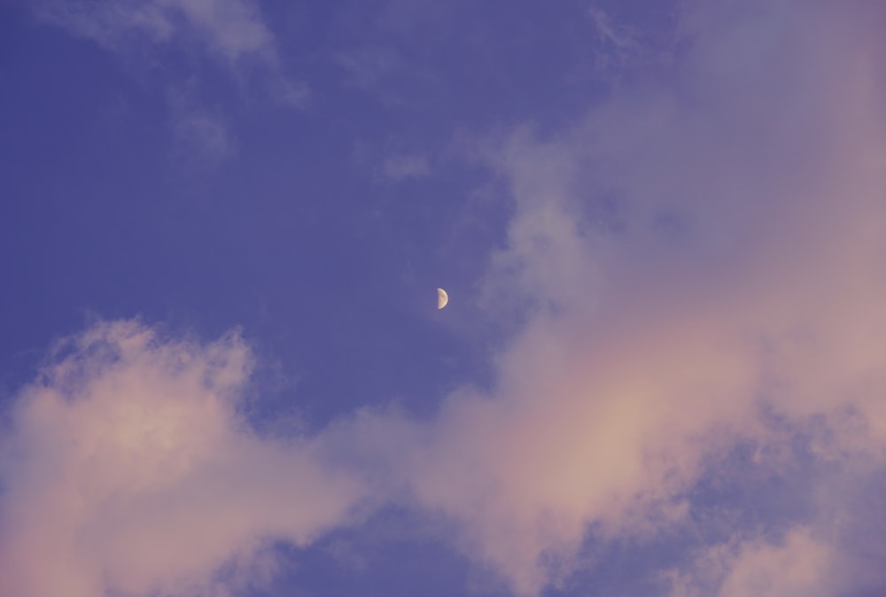 white and blue sky with moon